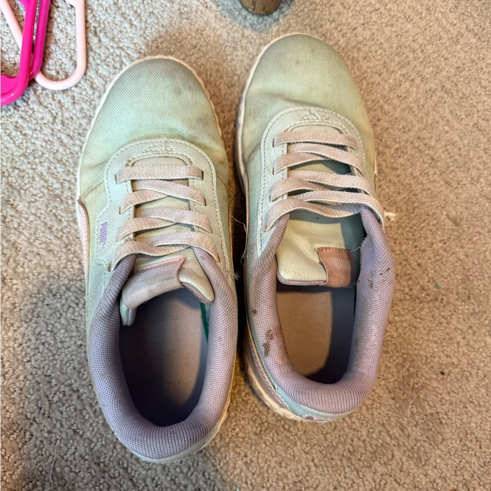 Purple Puma Sneakers. They are definitely worn, but still have lots of life left